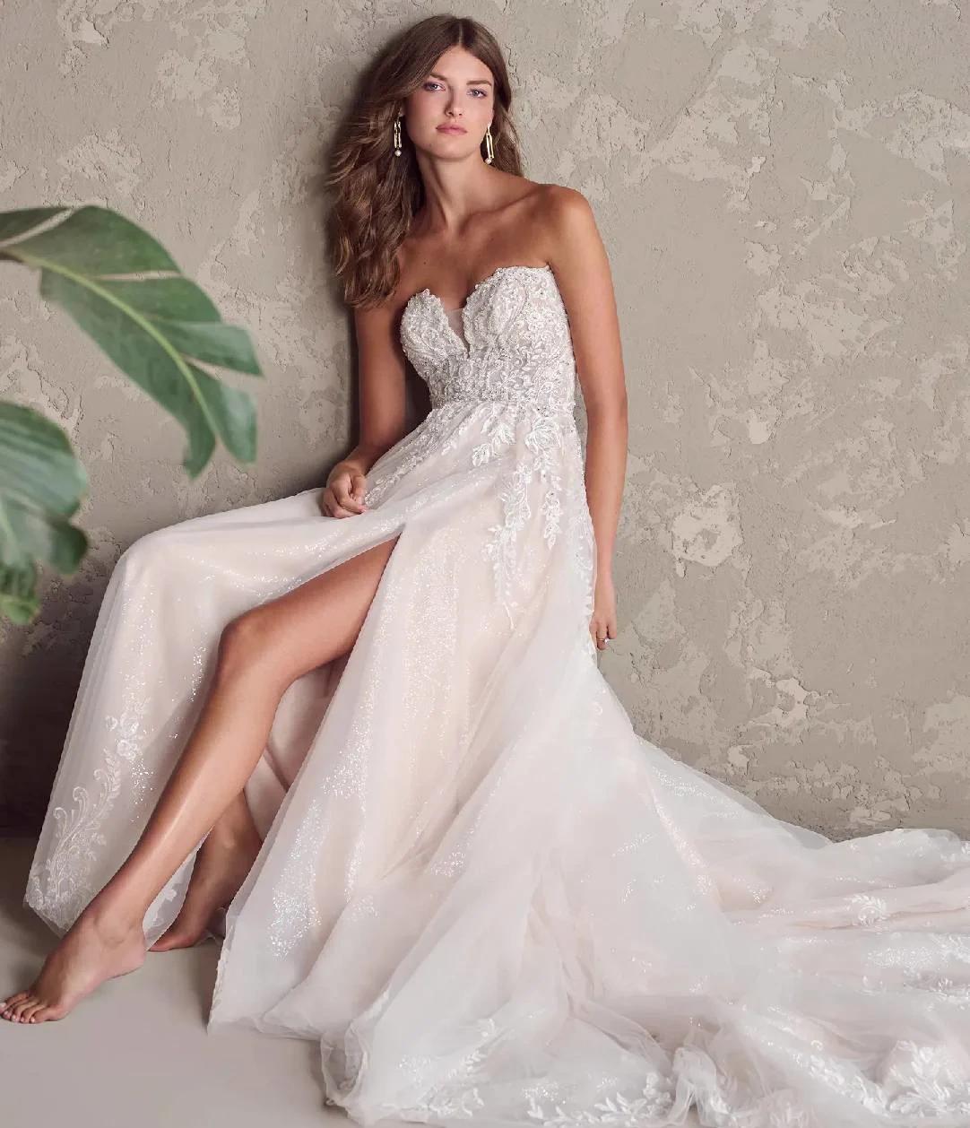 Photo of Model Wearing a Maggie Sottero Gown